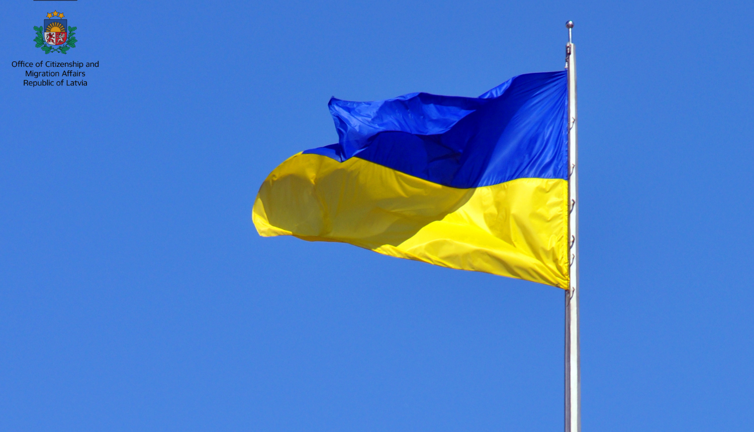 Ukrainian flag with Ocma logo in English